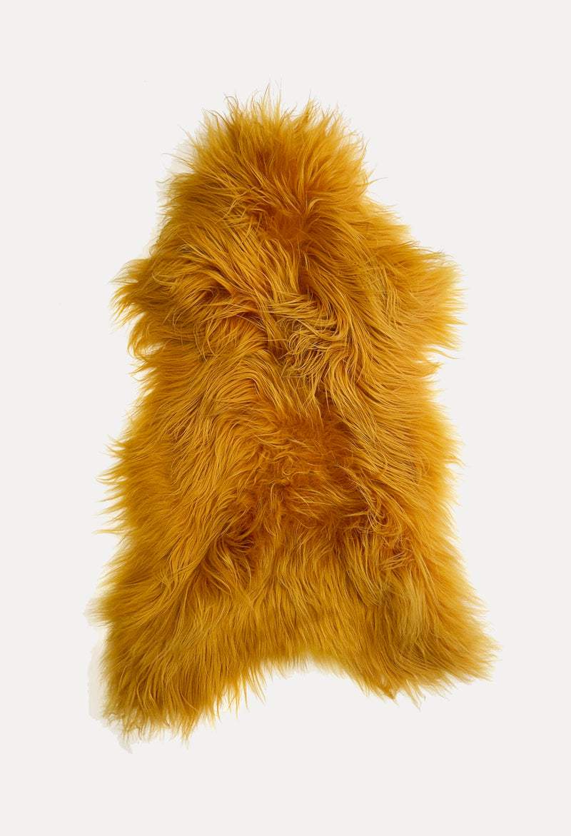 yellow sheepskin rug
