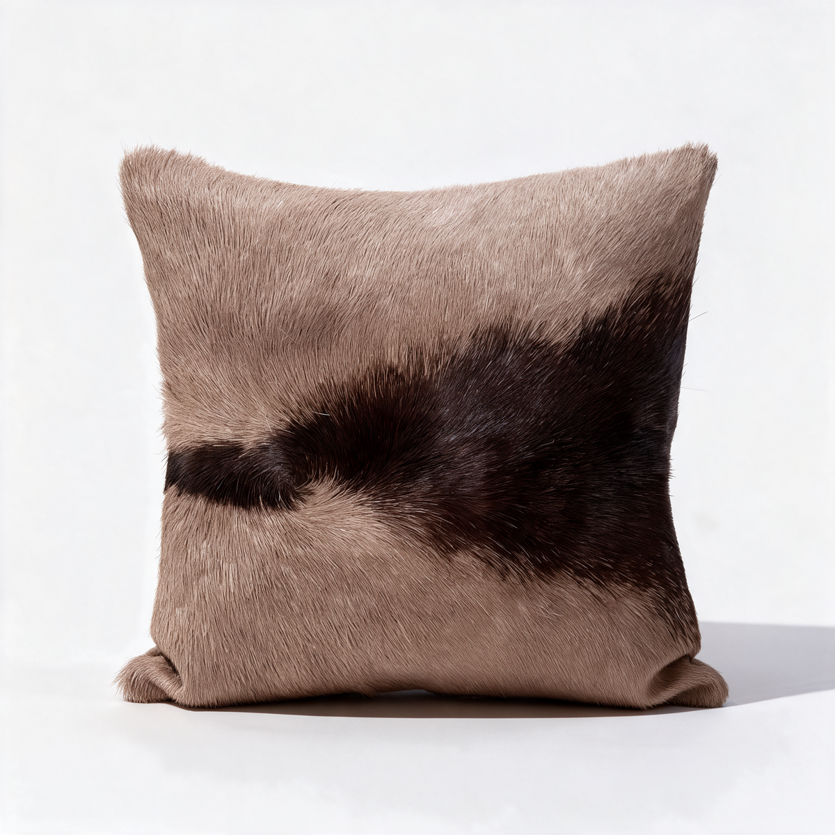 African gemsbok hide pillow with natural taupe and dark brown markings
