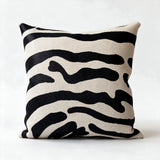 Stenciled zebra cowhide pillow in black and natural ivory hair-on-hide