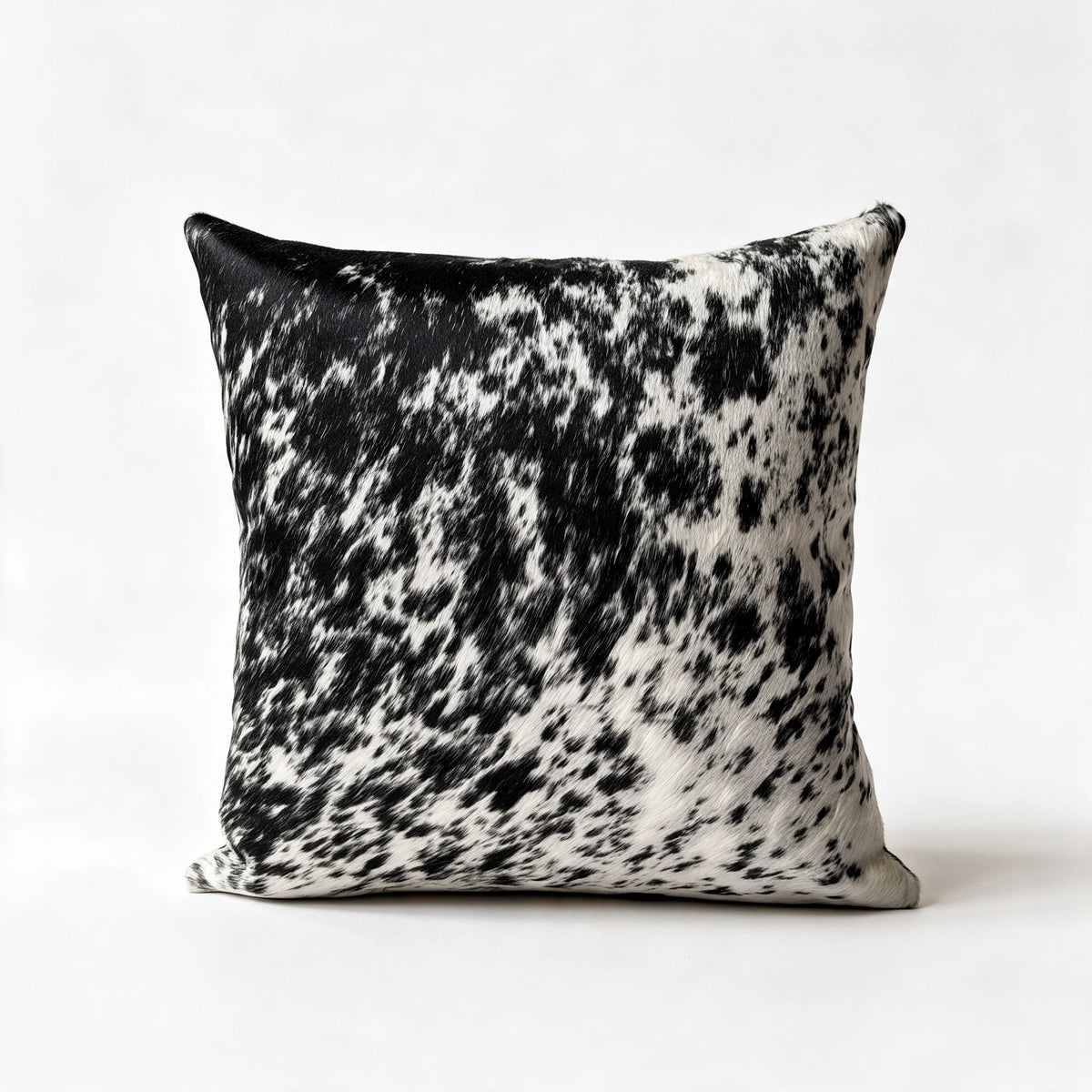 Natural salt and pepper black and white cowhide pillow in 20 x 20 size