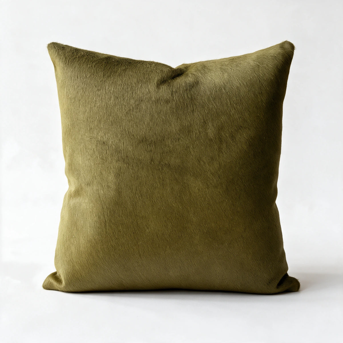 Moss green cowhide pillow in 20 x 20 square size