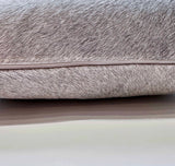 Natural gray cowhide pillow detail with hidden zipper closure