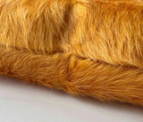 Marigold cowhide pillow detail with hidden zipper closure