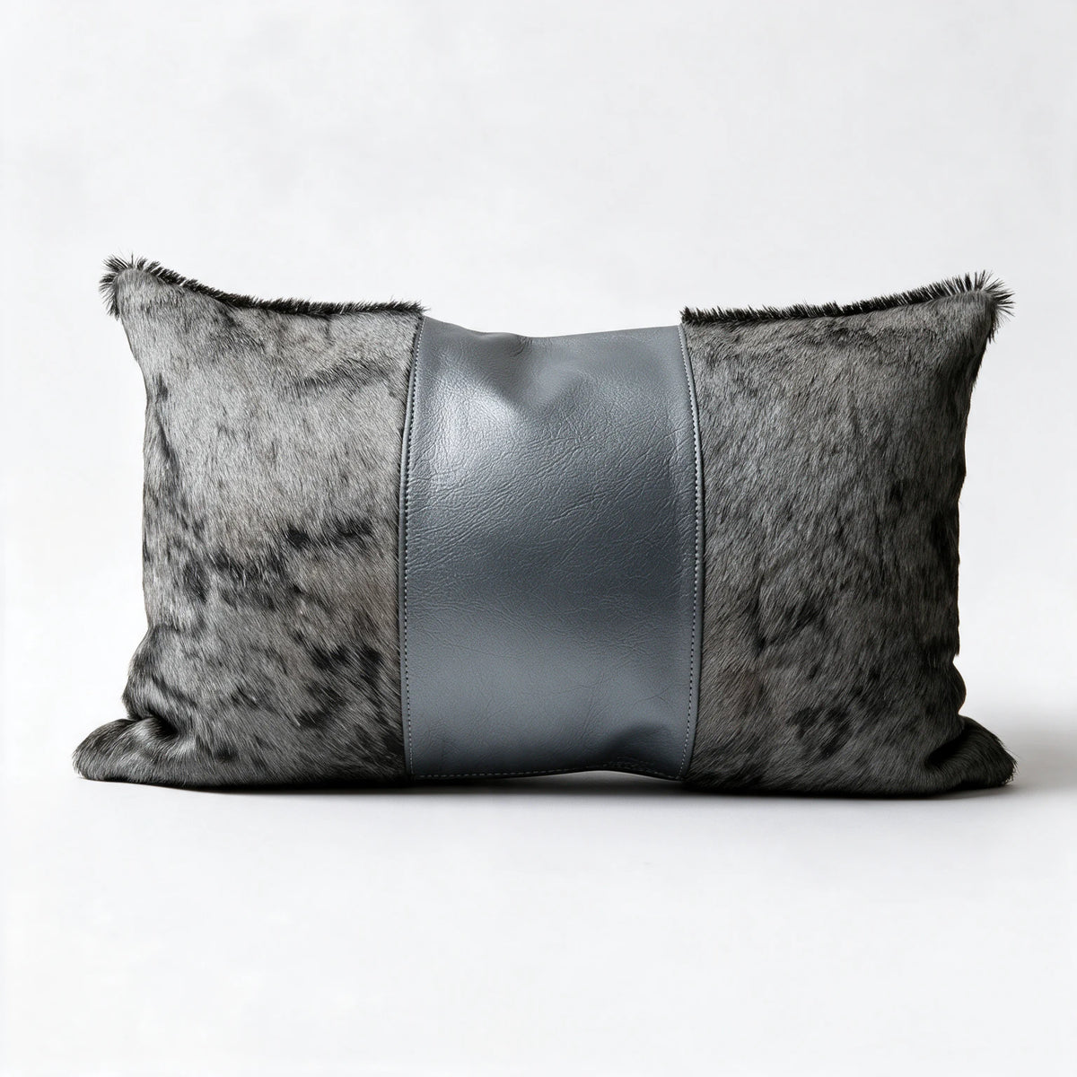 African blue wildebeest hide pillow with pewter gray leather center panel