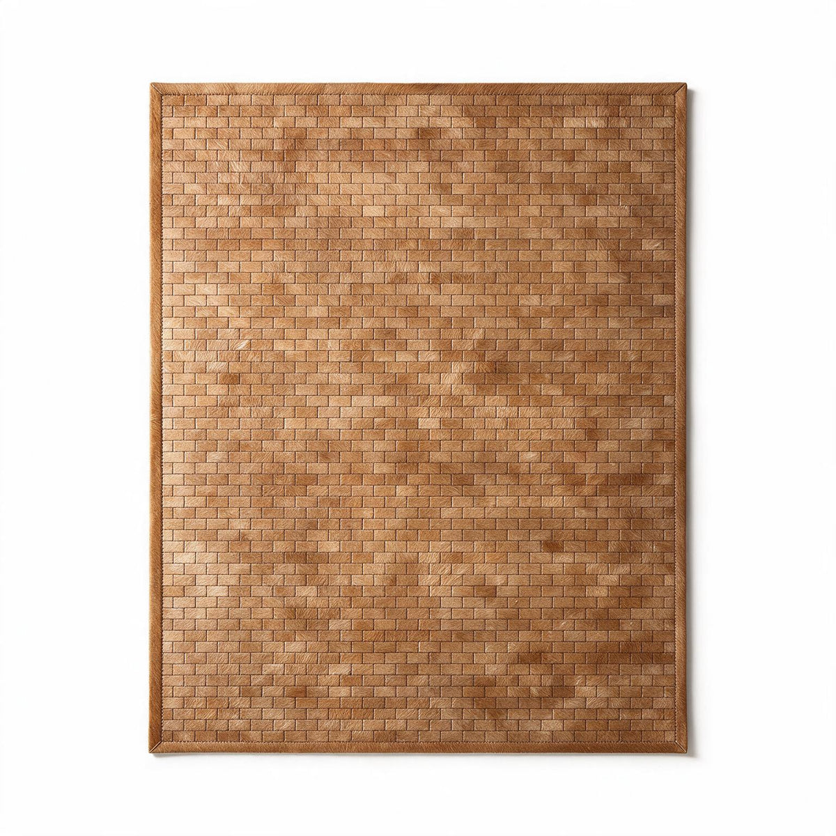 Savona custom stitched cowhide rug visualization showing an 8-by-10-foot brick pattern in warm caramel tan with a narrow border.
