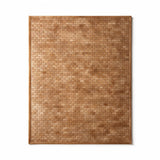 Savona custom stitched cowhide rug visualization showing an 8-by-10-foot brick pattern in warm caramel tan with a narrow border.
