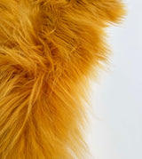 yellow sheepskin rug