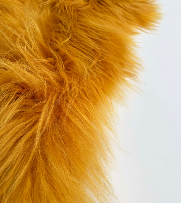 yellow sheepskin rug
