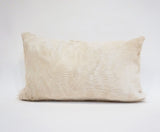 white cowhide pillow