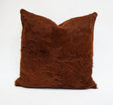 brown cowhide pillow