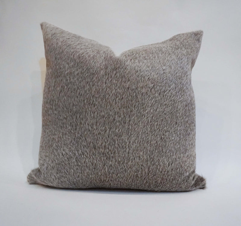 gray cowhide pillow