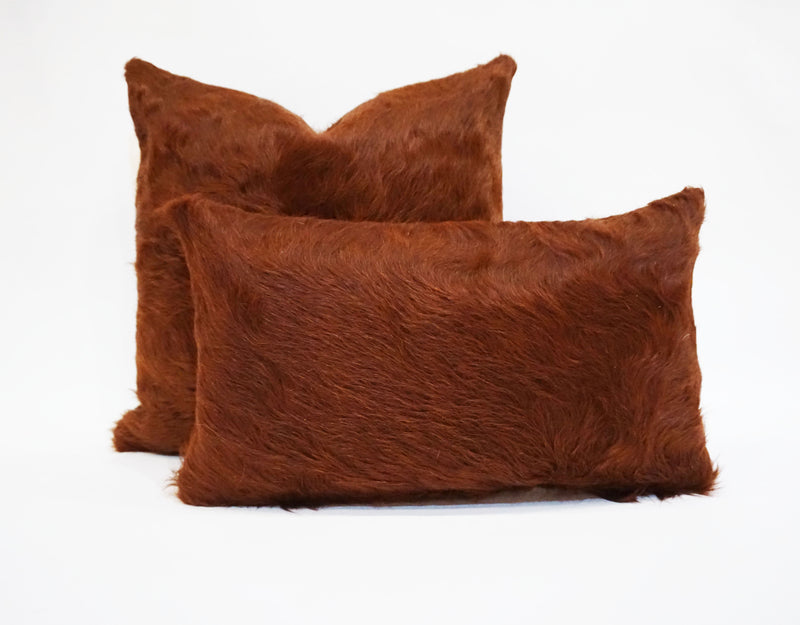 brown cowhide pillow