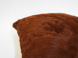 brown cowhide pillow