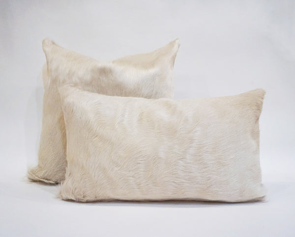 white cowhide pillow