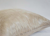 white cowhide pillow