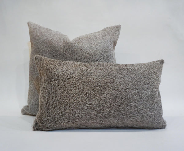 gray cowhide pillow