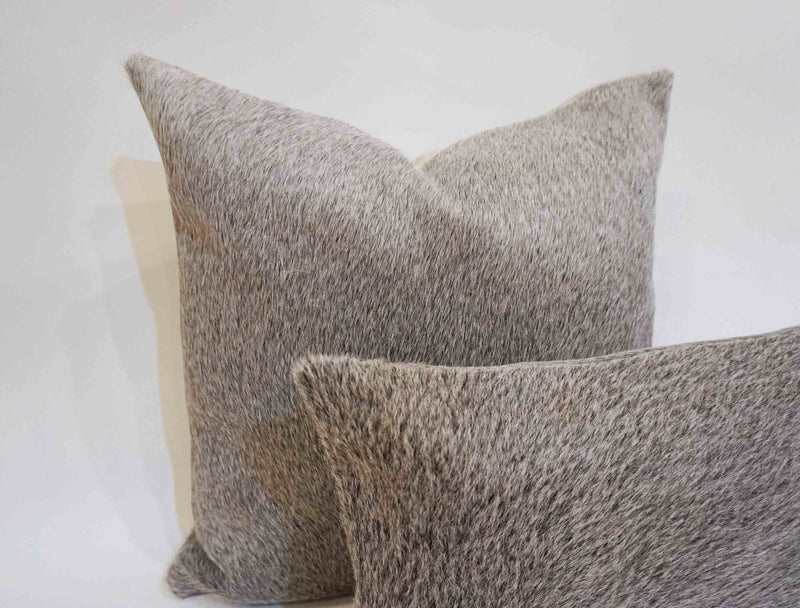 gray cowhide pillow