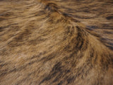 brown black cowhide rug