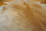 gray brown cowhide fur rug