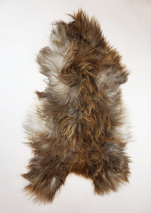 gray brown sheepskin fur rug