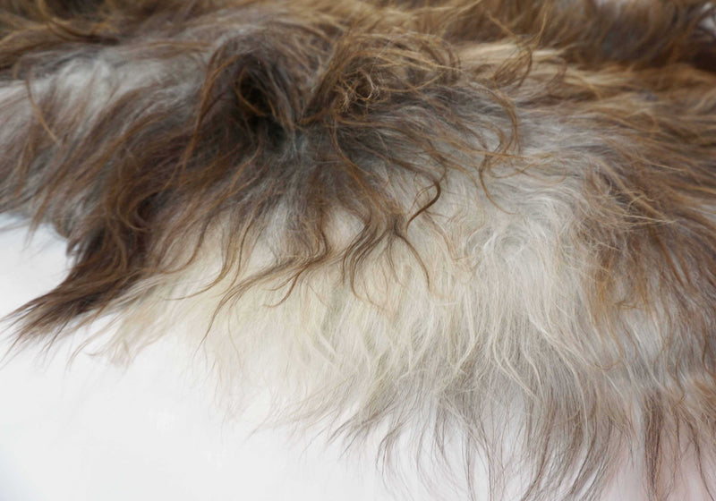 gray brown sheepskin fur rug