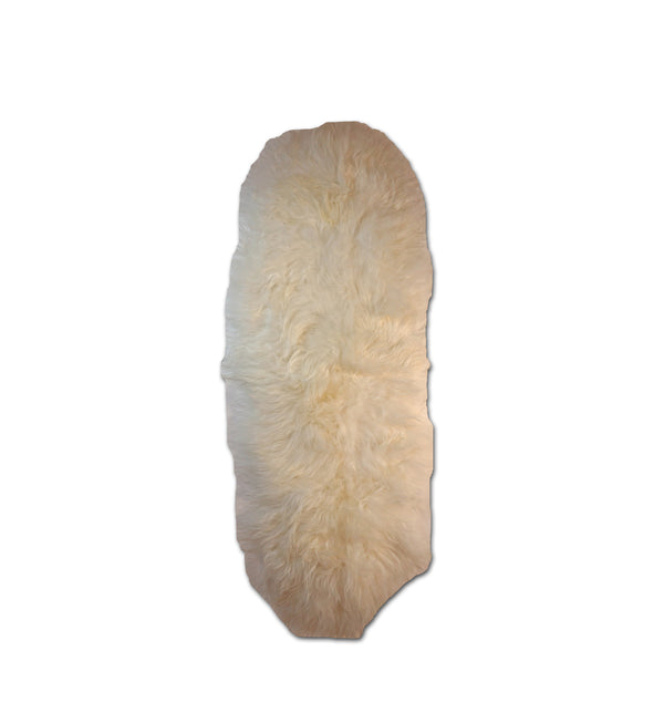 white sheepskin fur rug