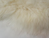 white sheepskin fur rug
