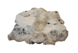 brown white sheepskin rug