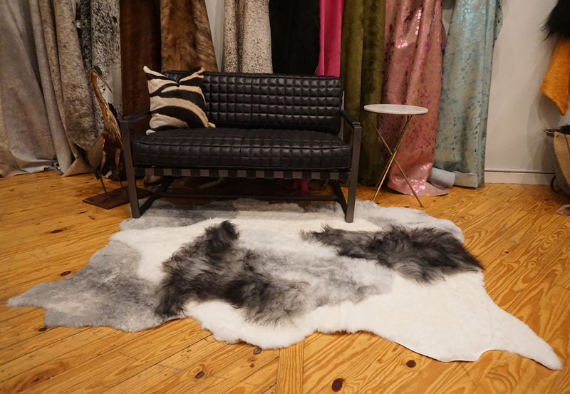 gray white sheepskin rug