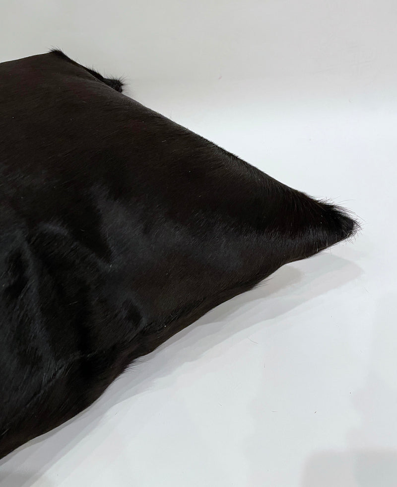 black cowhide pillow