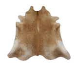 brown cowhide rug