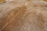 brown cowhide rug