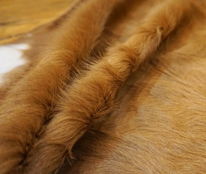 brown cowhide rug