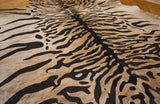 stenciled tiger cowhide rug