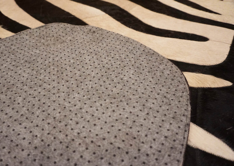 stitched zebra cowhide rug