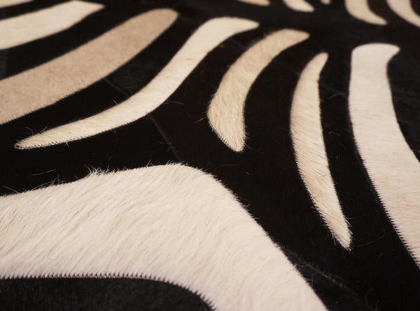 stitched zebra cowhide rug