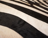 stitched zebra cowhide rug