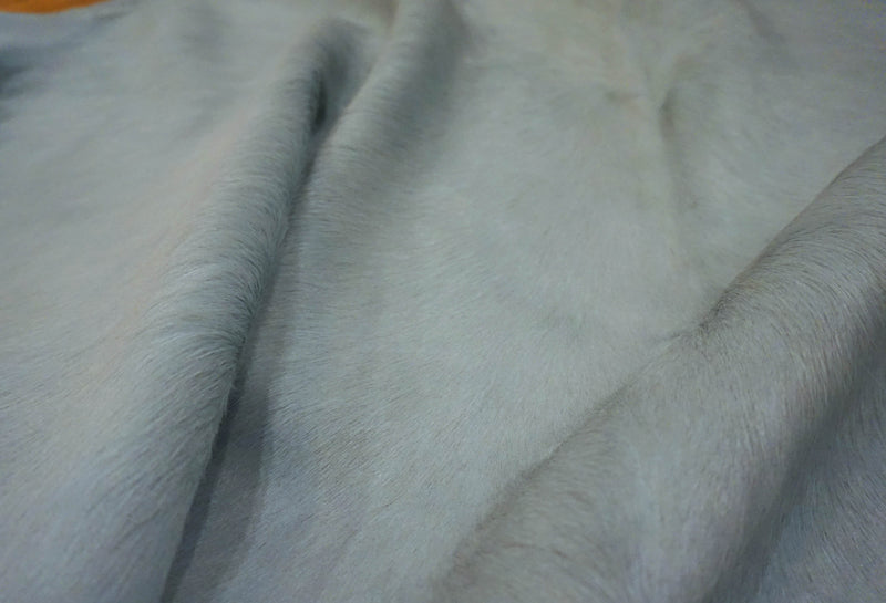 dyed light blue cowhide rug