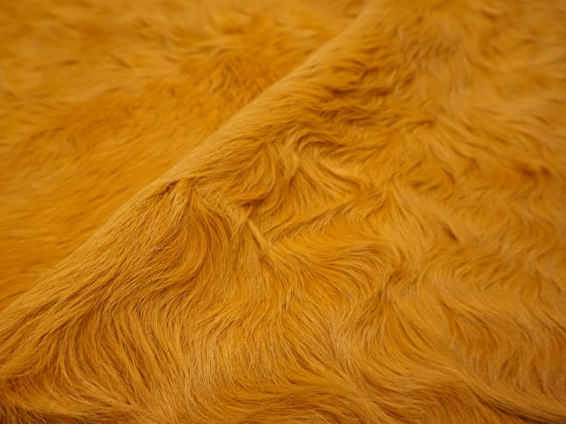 dyed Hermes orange cowhide rug