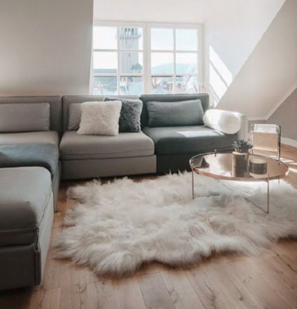 Natural white multi-pelt Icelandic sheepskin rug in a contemporary interior