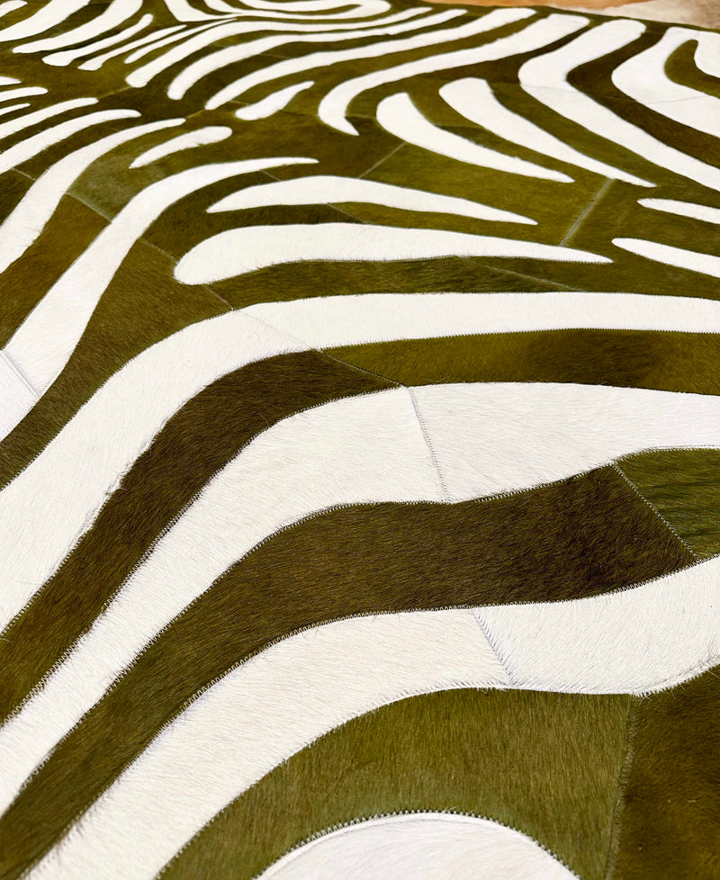 green stitched zebra cowhide rug